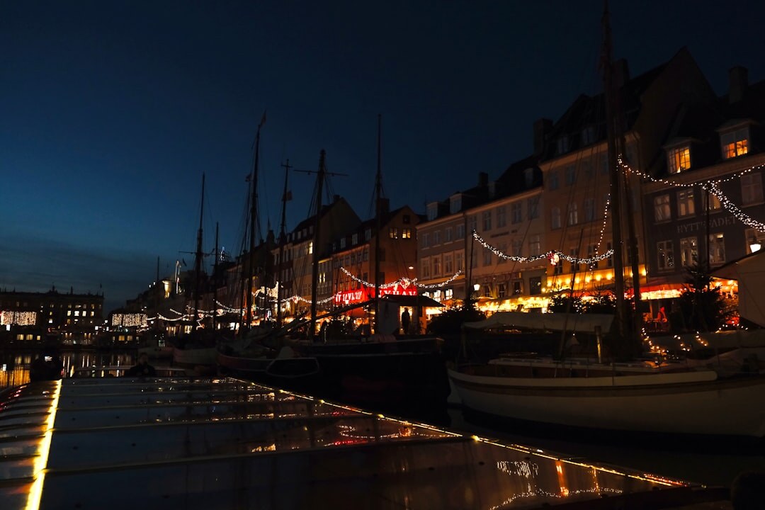 Danish harbor with fishing boats at dusk