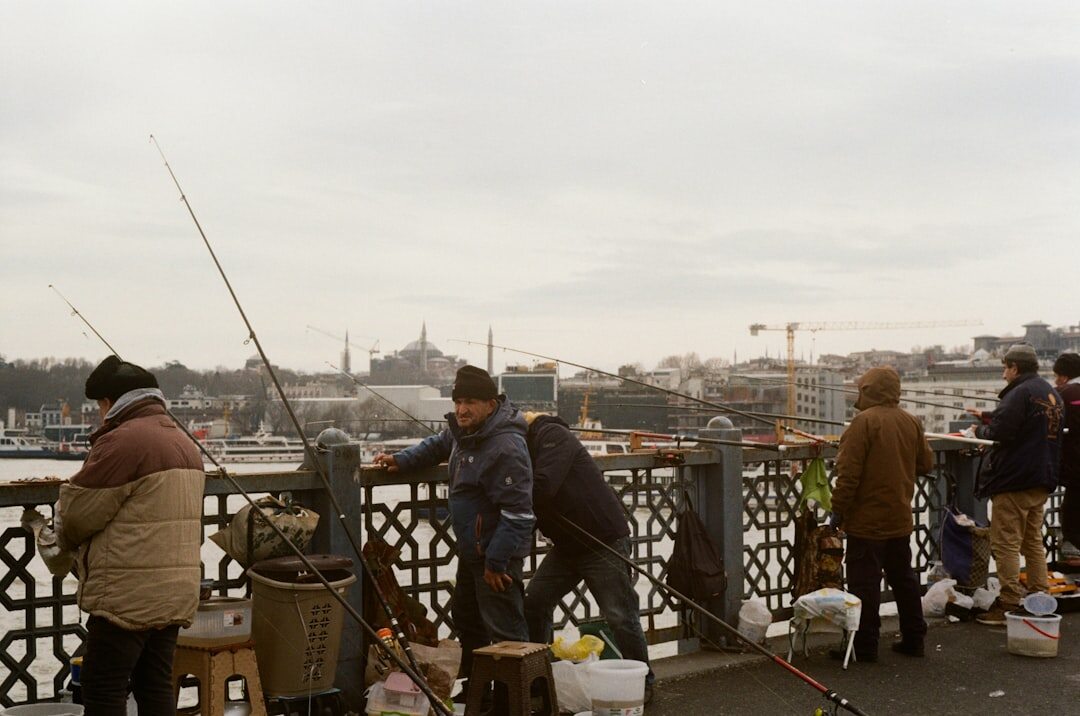 fishermen at harbor pulling nets